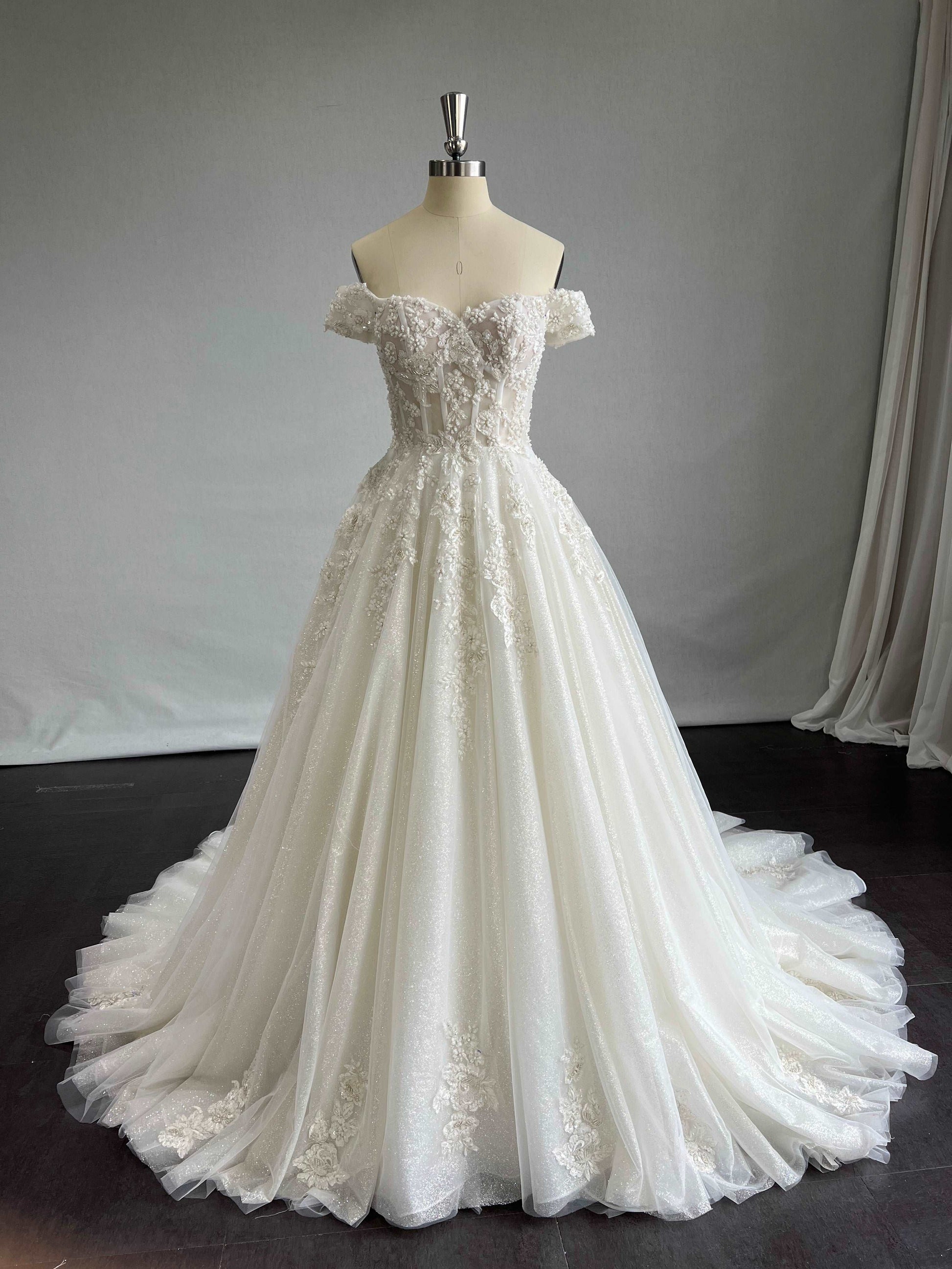 Off Shoulder Beaded Lace & Glitter A-Line Wedding Dress | Shop A.Cherie Light Ivory / Custom Size Off Shoulder Beaded Lace & Glitter A-Line Wedding Dress | Shop A.Cherie Light Ivory / Custom Size